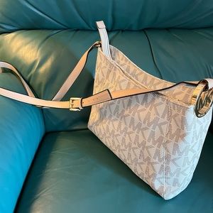 MK cream and beige zipper purse